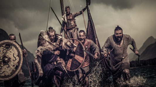Viking war party carrying various weapons and shields