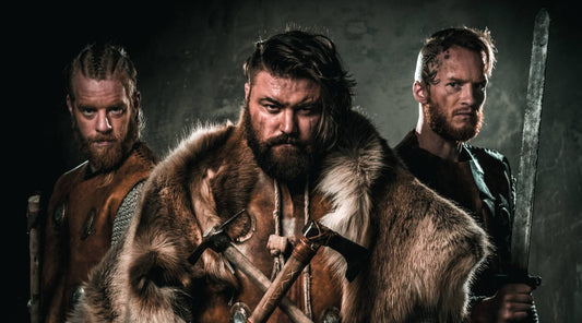 Three Vikings in different Vikings clothing
