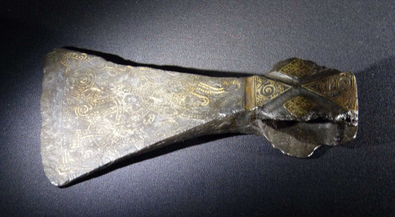 Ornamented silver-inlaid iron axe, 11th–13th century