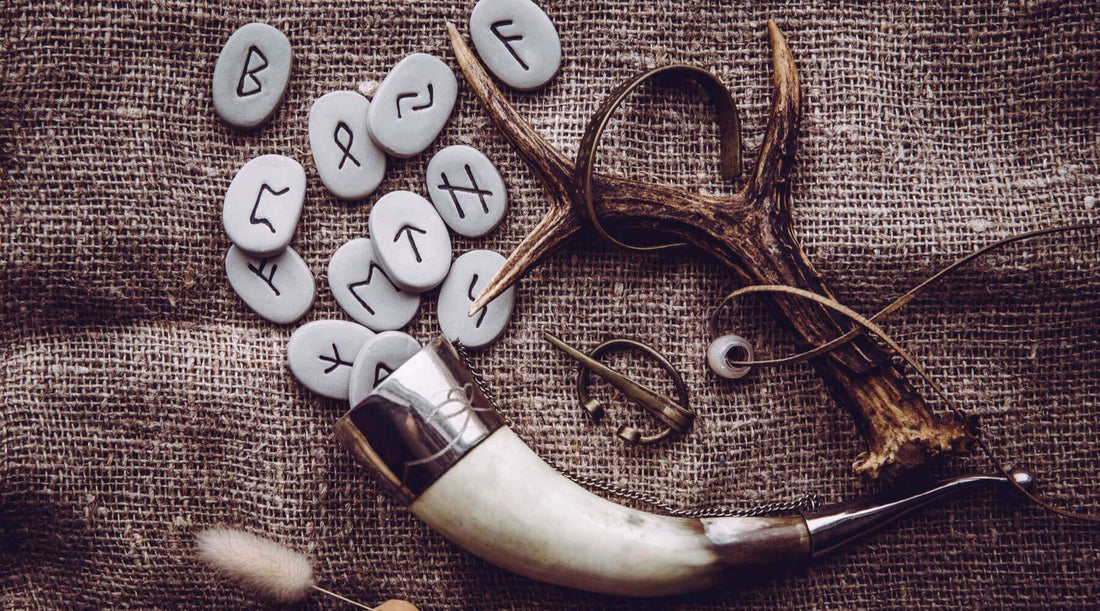 Norse mythology symbols scattered on the ground