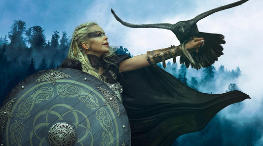 Norse Female Warrior holding a shield and a raven