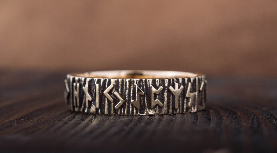 Viking wedding ring on a wooden background