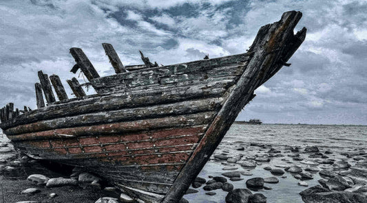 Destroyed Viking longship on a sandy beach