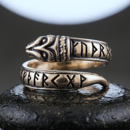 Handmade bronze serpent ring coiled in an open spiral with Elder Futhark runes