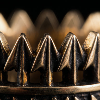 Macro of the openwork bronze arrowheads on the Viking ring