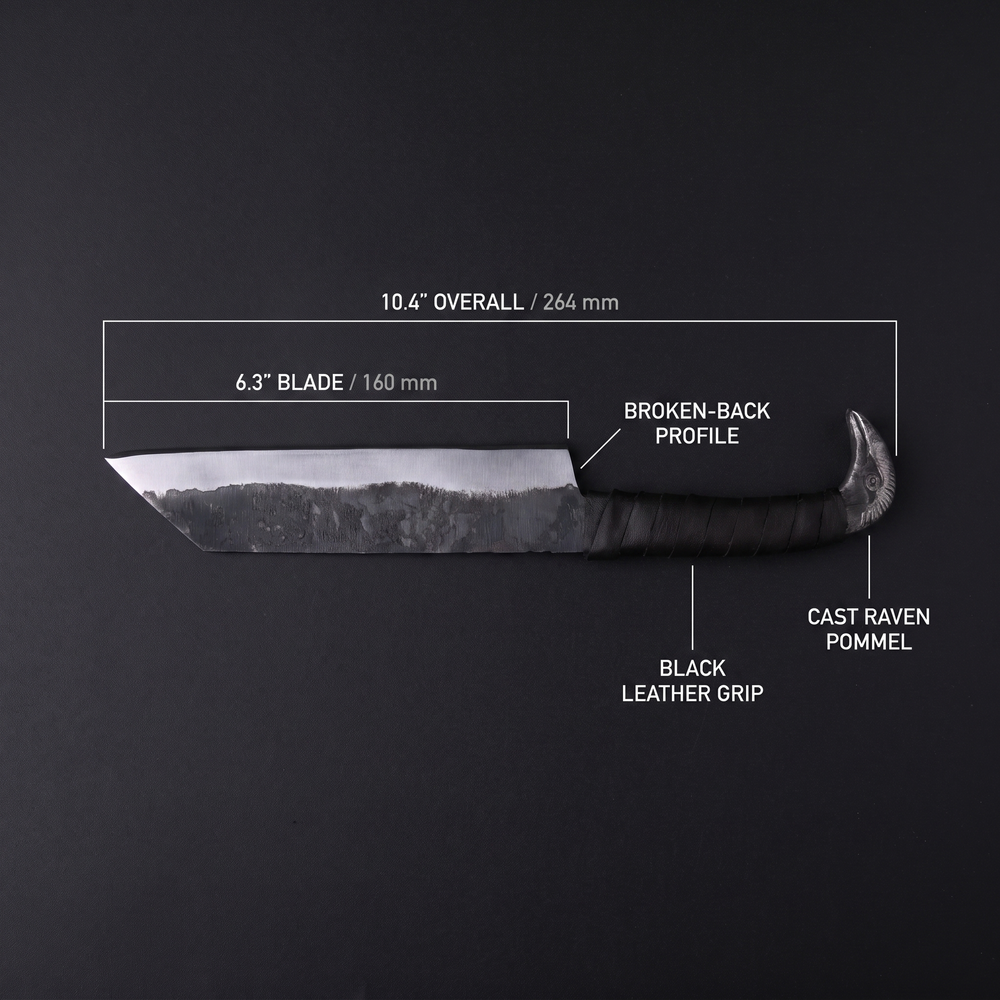 Dimension diagram of the Broken-Back seax: 6.3 inch blade, 10.4 inch overall, broken-back profile, cast raven pommel, black leather grip