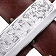 Close-up of the etched runic band and interlaced Norse beast knotwork on the langseax carbon steel blade
