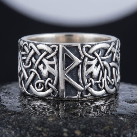 Handmade 925 silver Viking ring seen front on, Raido rune between Urnes beast interlace