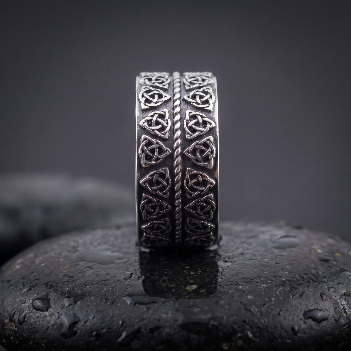 Handmade 925 silver ring seen front on, double rows of Norse triquetra knots