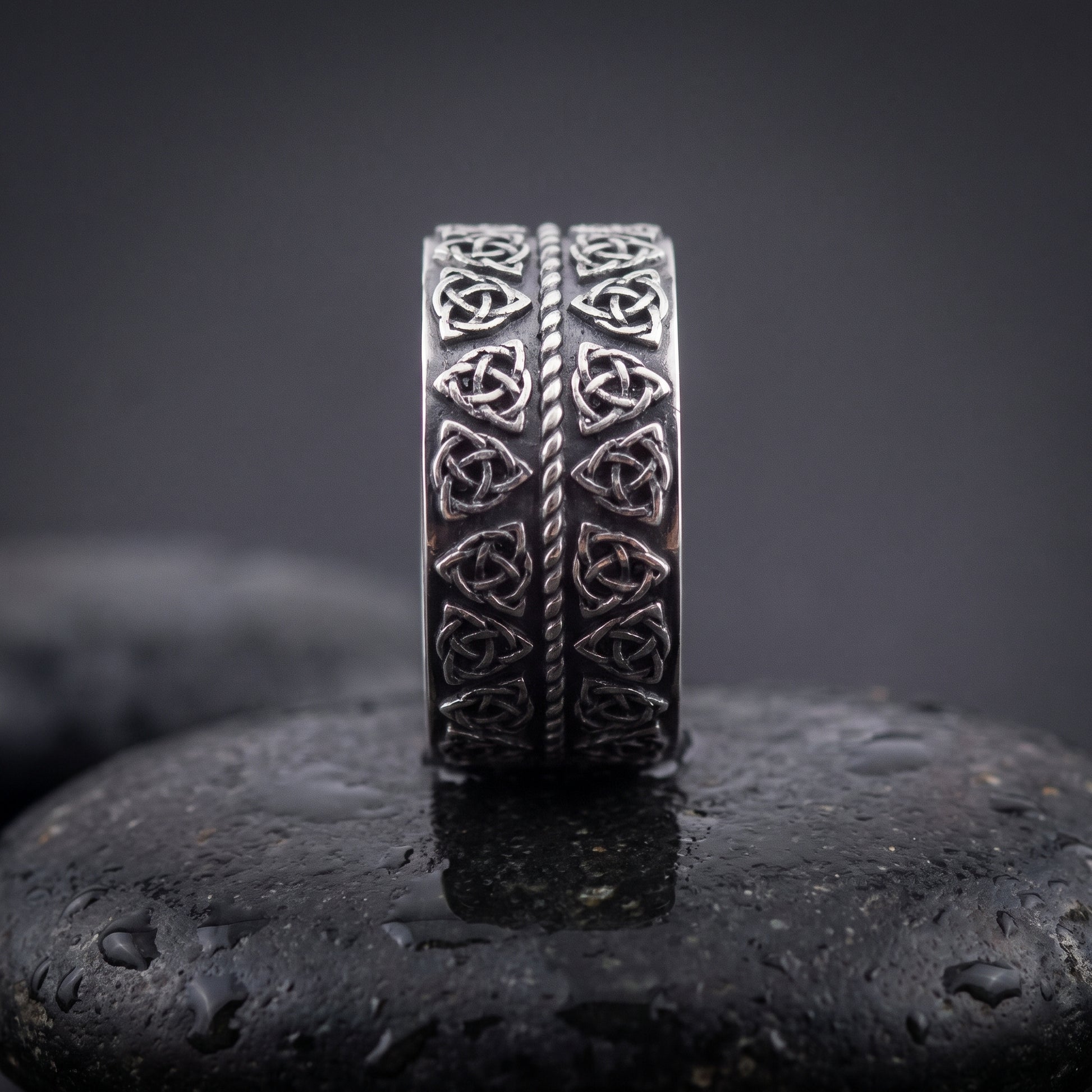 Handmade 925 silver ring seen front on, double rows of Norse triquetra knots