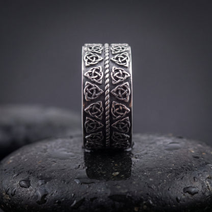 Handmade 925 silver ring seen front on, double rows of Norse triquetra knots