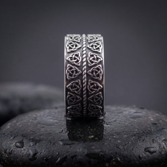 Handmade 925 silver ring seen front on, double rows of Norse triquetra knots