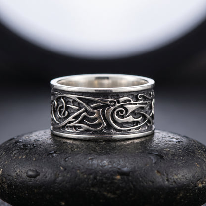 Handmade 925 silver Viking ring seen front on, fine Norse interlace between polished rails
