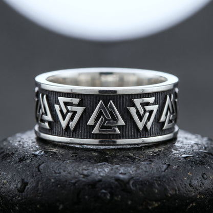 Handmade 925 silver Viking ring seen front on, Valknuts on an oxidised hatched ground