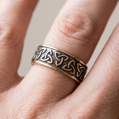 Bronze triquetra Viking ring worn on a finger