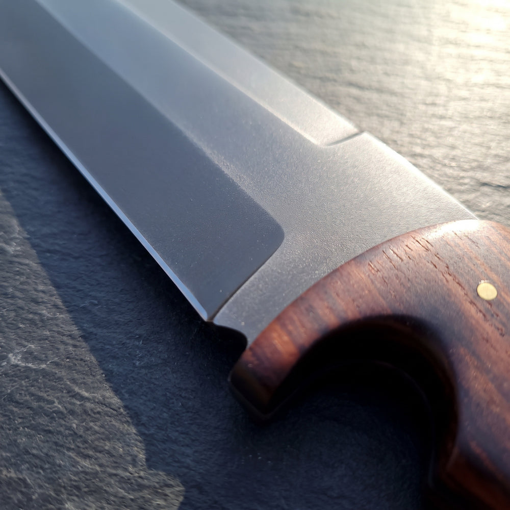 Flat grind and finger choil on the 1075 high-carbon seax blade