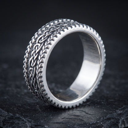 Braided silver Viking ring from the side, polished interior visible
