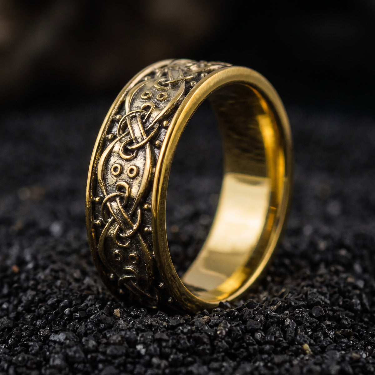 Solid gold Viking wedding ring with Norse knotwork and raised bosses