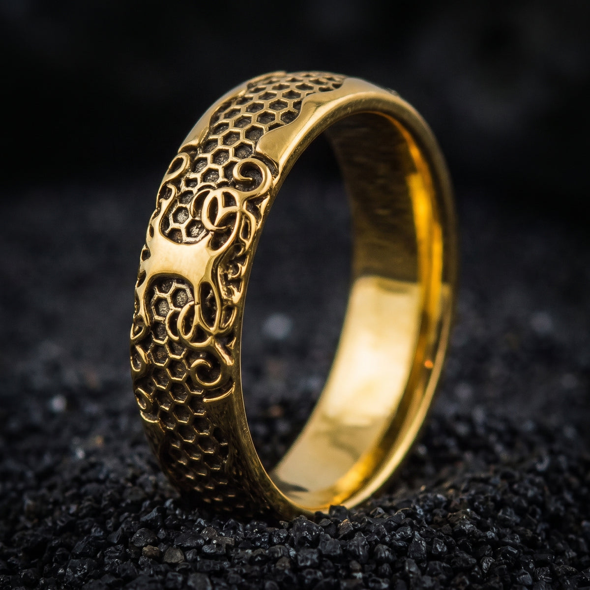Solid gold Viking wedding ring with scale and scroll panels