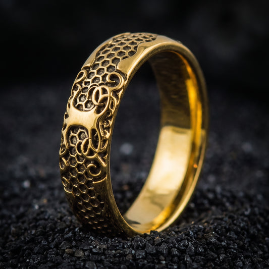 Solid gold Viking wedding ring with scale and scroll panels