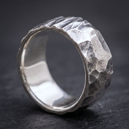 Hammered silver Viking band from the side, smooth polished interior