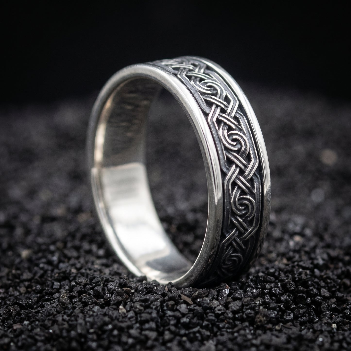 Sterling silver Viking wedding ring with a chain of Norse knots in an oxidised channel
