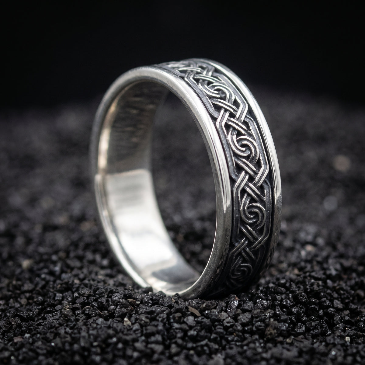 Sterling silver Viking wedding ring with a chain of Norse knots in an oxidised channel
