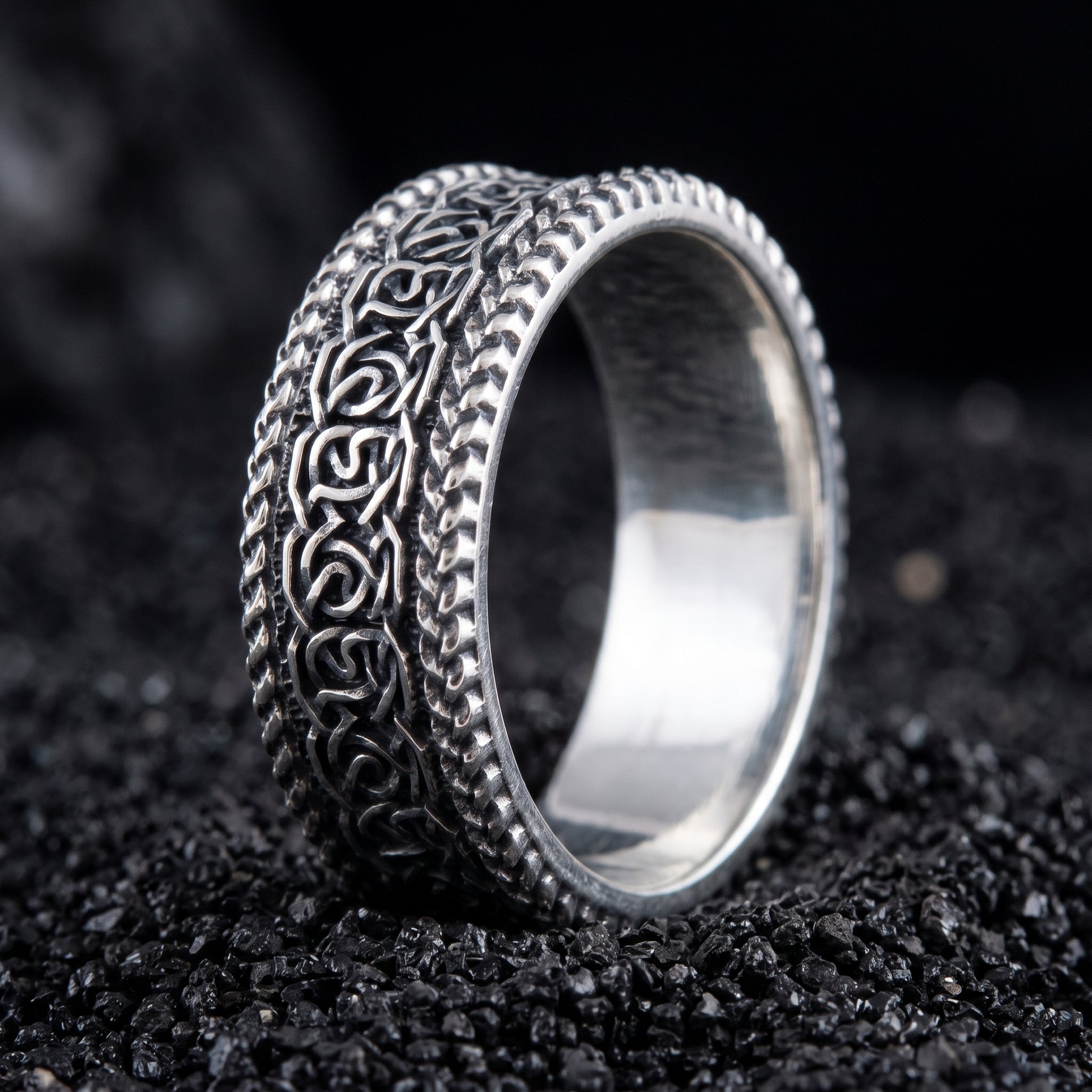 Sterling silver Viking wedding ring with Norse knotwork between twisted rope rails