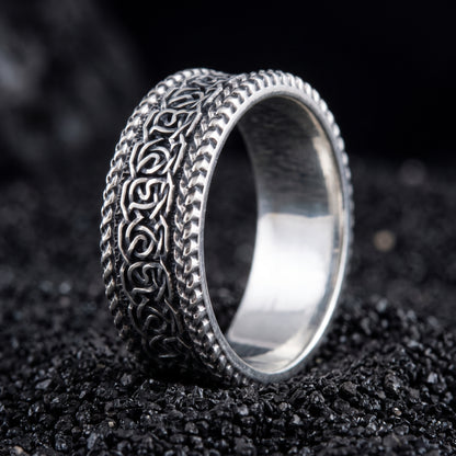 Sterling silver Viking wedding ring with Norse knotwork between twisted rope rails