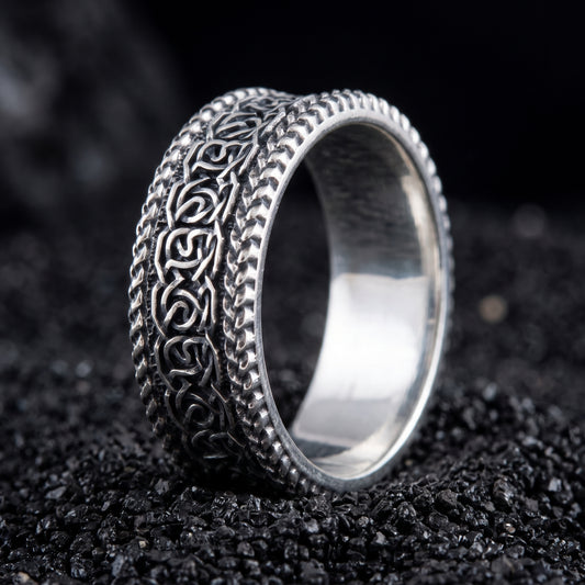 Sterling silver Viking wedding ring with Norse knotwork between twisted rope rails