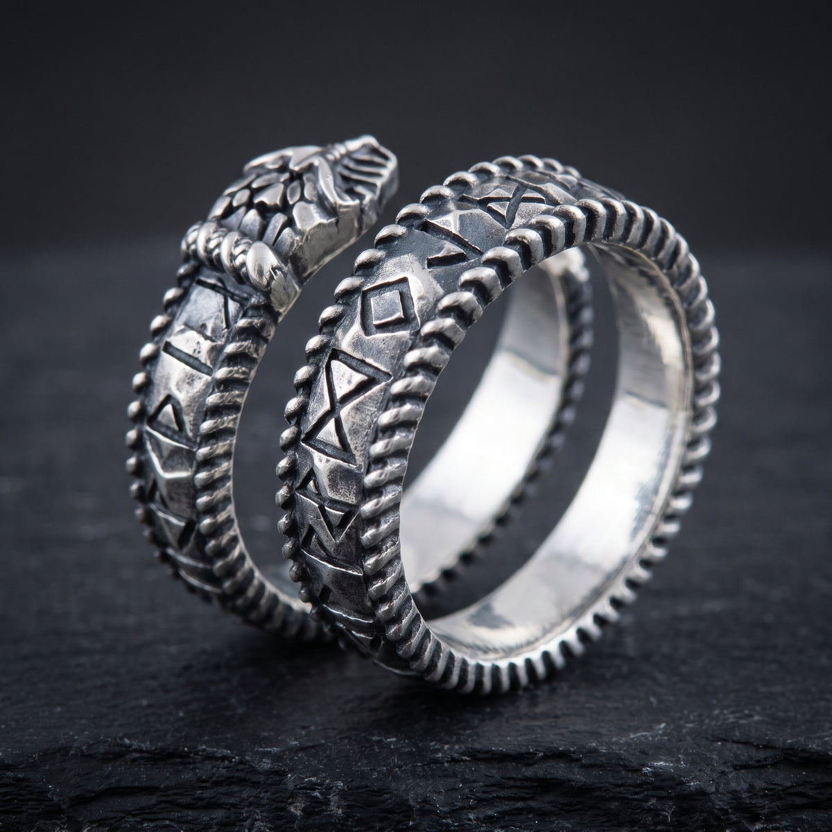 Open silver spiral Viking ring showing the polished interior and the gap between the ends