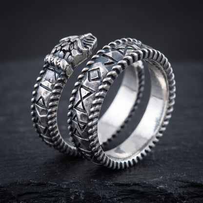 Open silver spiral Viking ring showing the polished interior and the gap between the ends