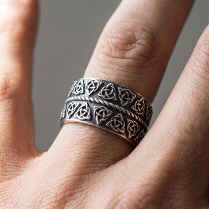 Silver triquetra Viking ring worn on a finger