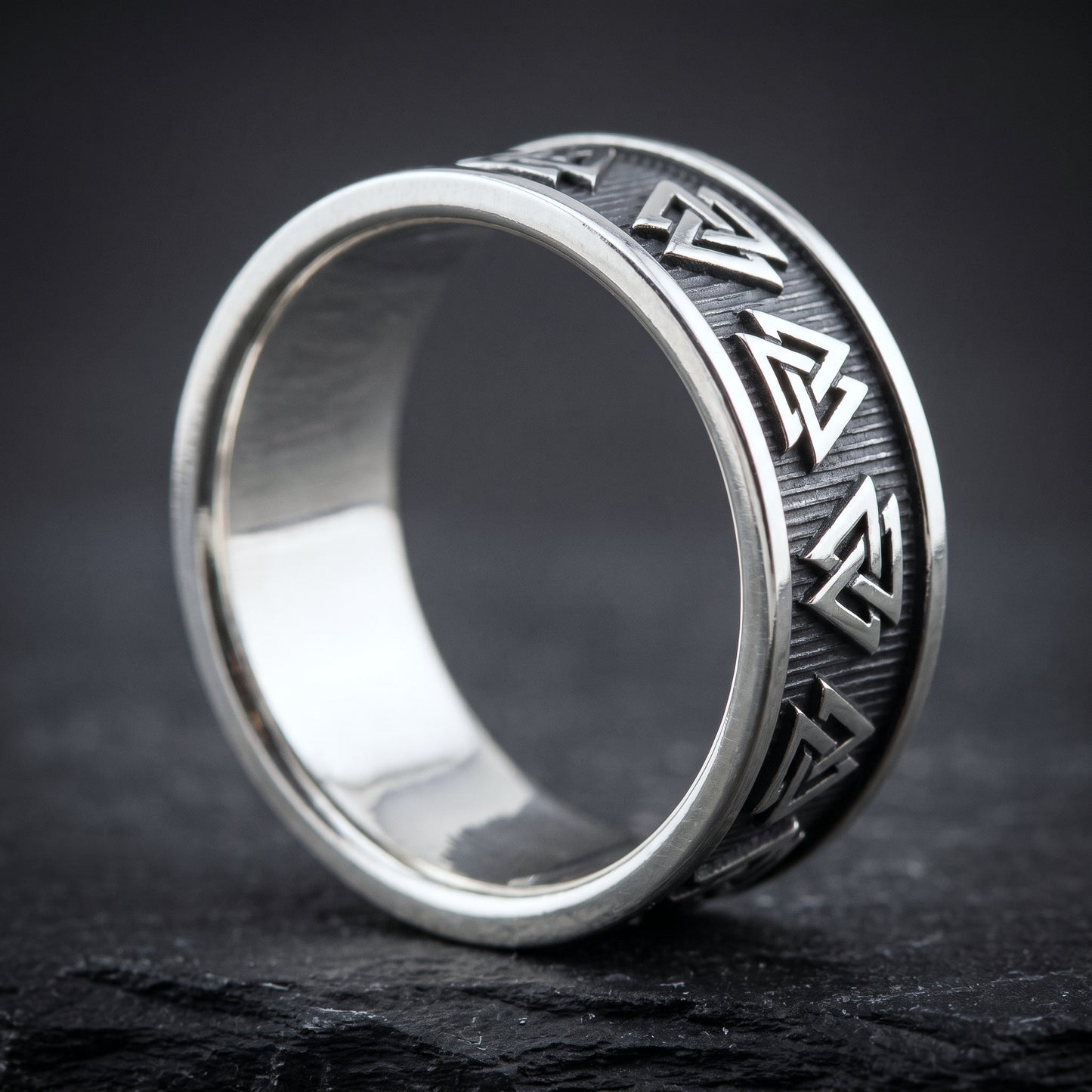 Silver Valknut Viking ring from the side, polished interior visible