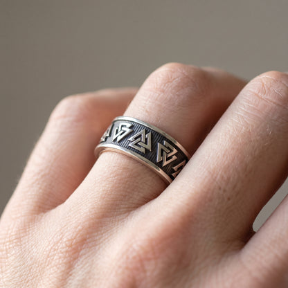 Silver Valknut Viking wedding ring worn on a finger