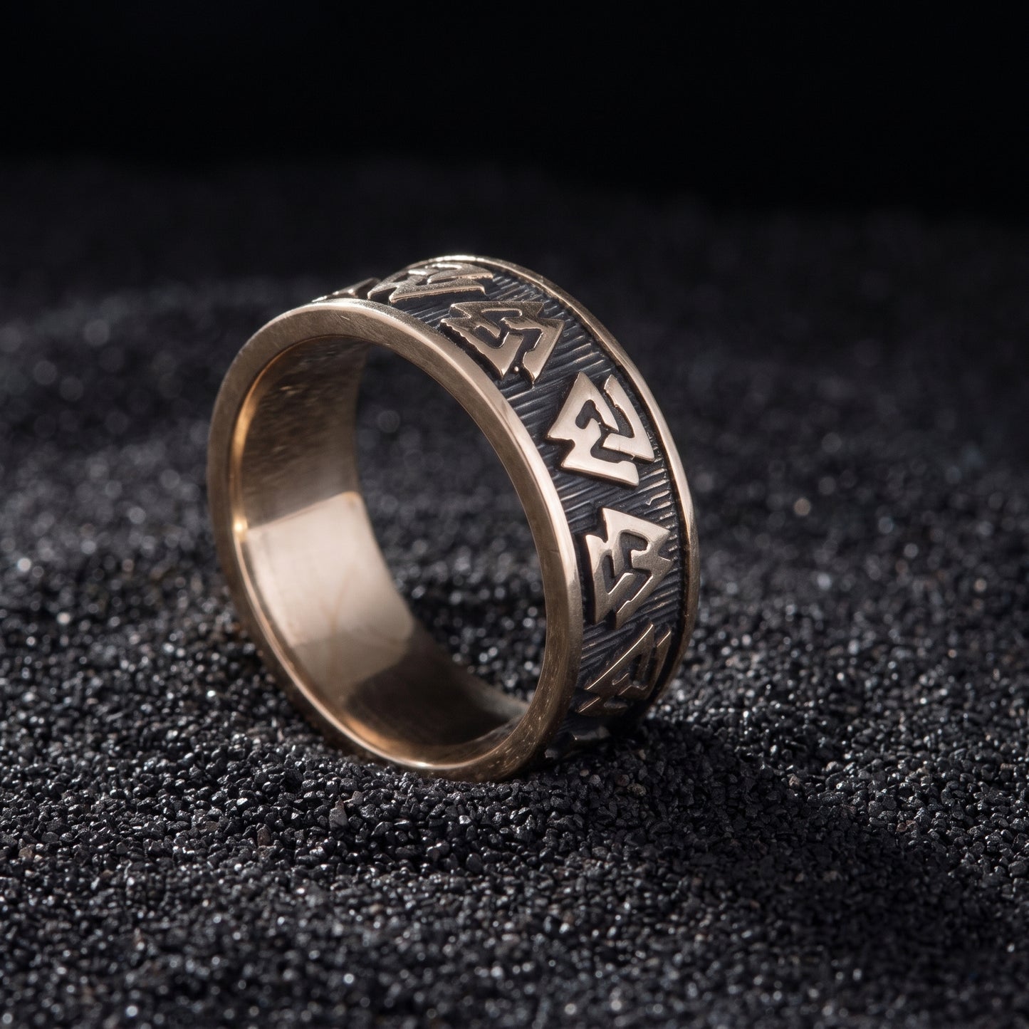 Bronze Valknut ring from the side, polished rims and plain polished interior