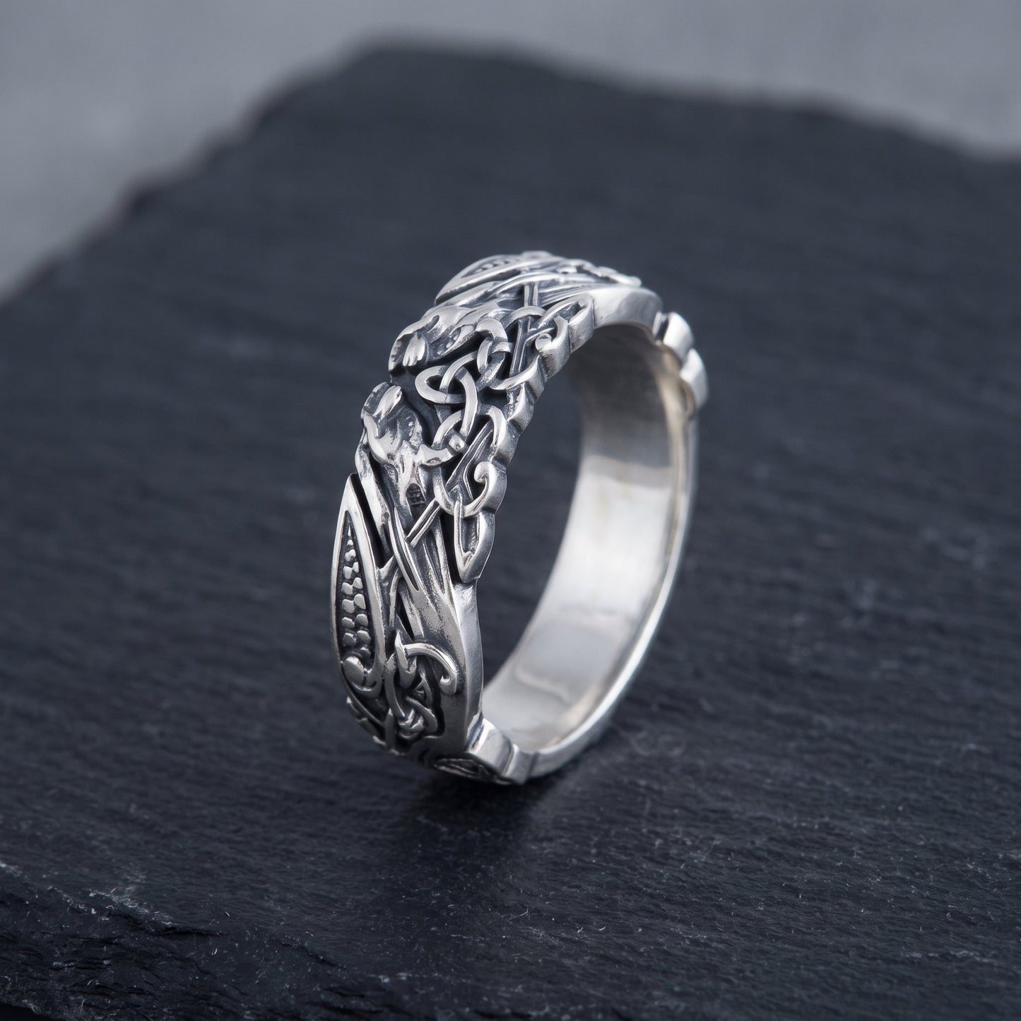 Norse wedding ring from the side, showing the interlace wrapping around the band