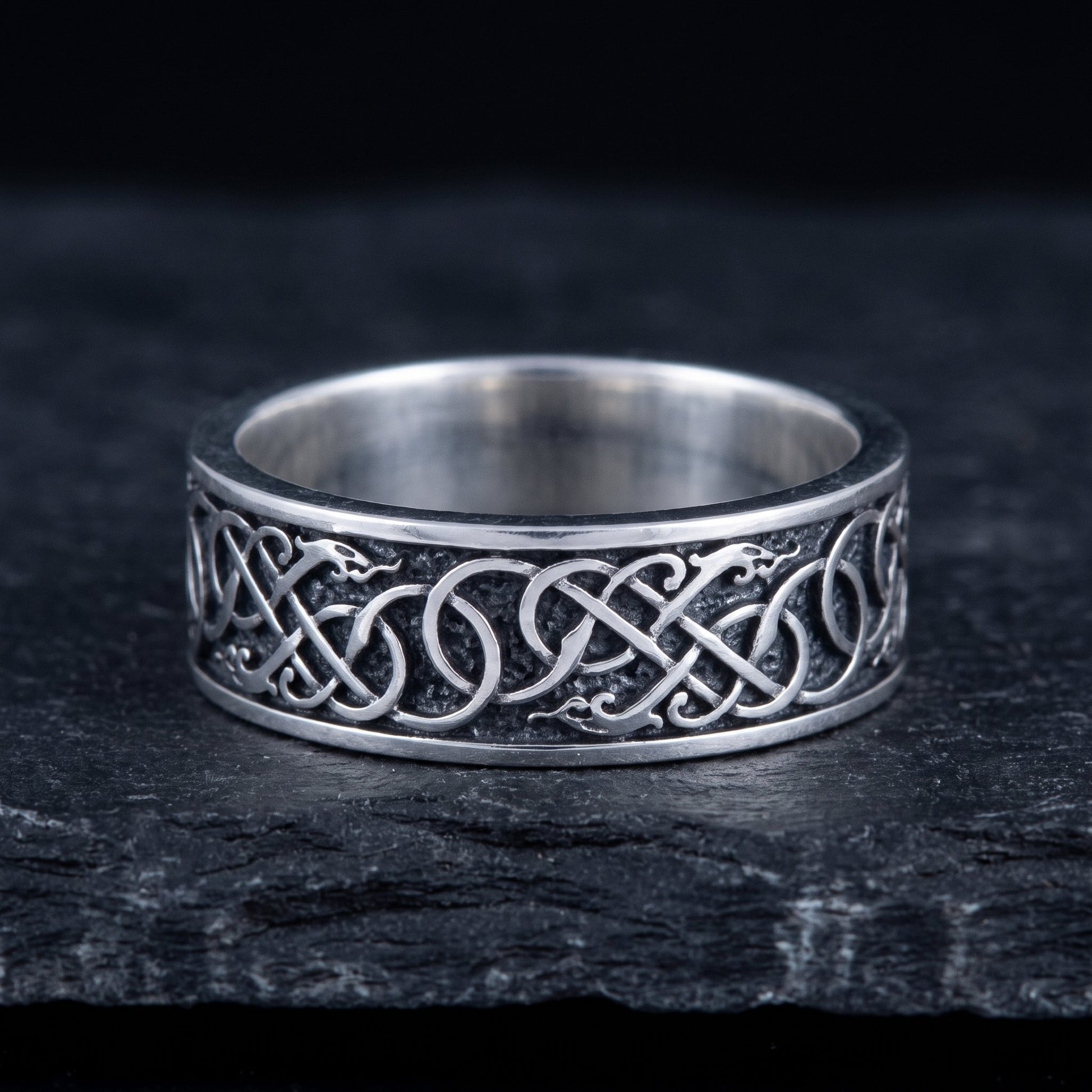 Close-up of the Urnes interlace and the polished rims on the sterling silver band