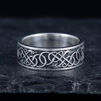 Close-up of the Urnes interlace and the polished rims on the sterling silver band