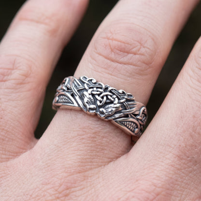 Viking wedding band worn on a finger, close up showing the width of the ring