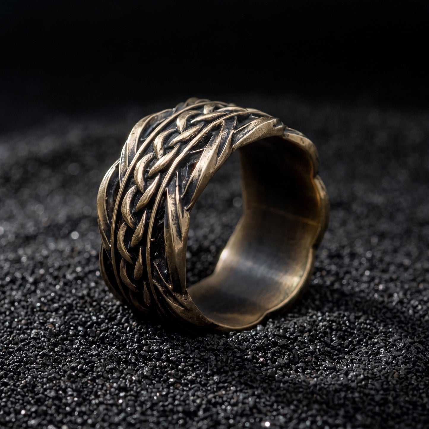Bronze Viking wedding ring from the side, scalloped rims and plain polished interior