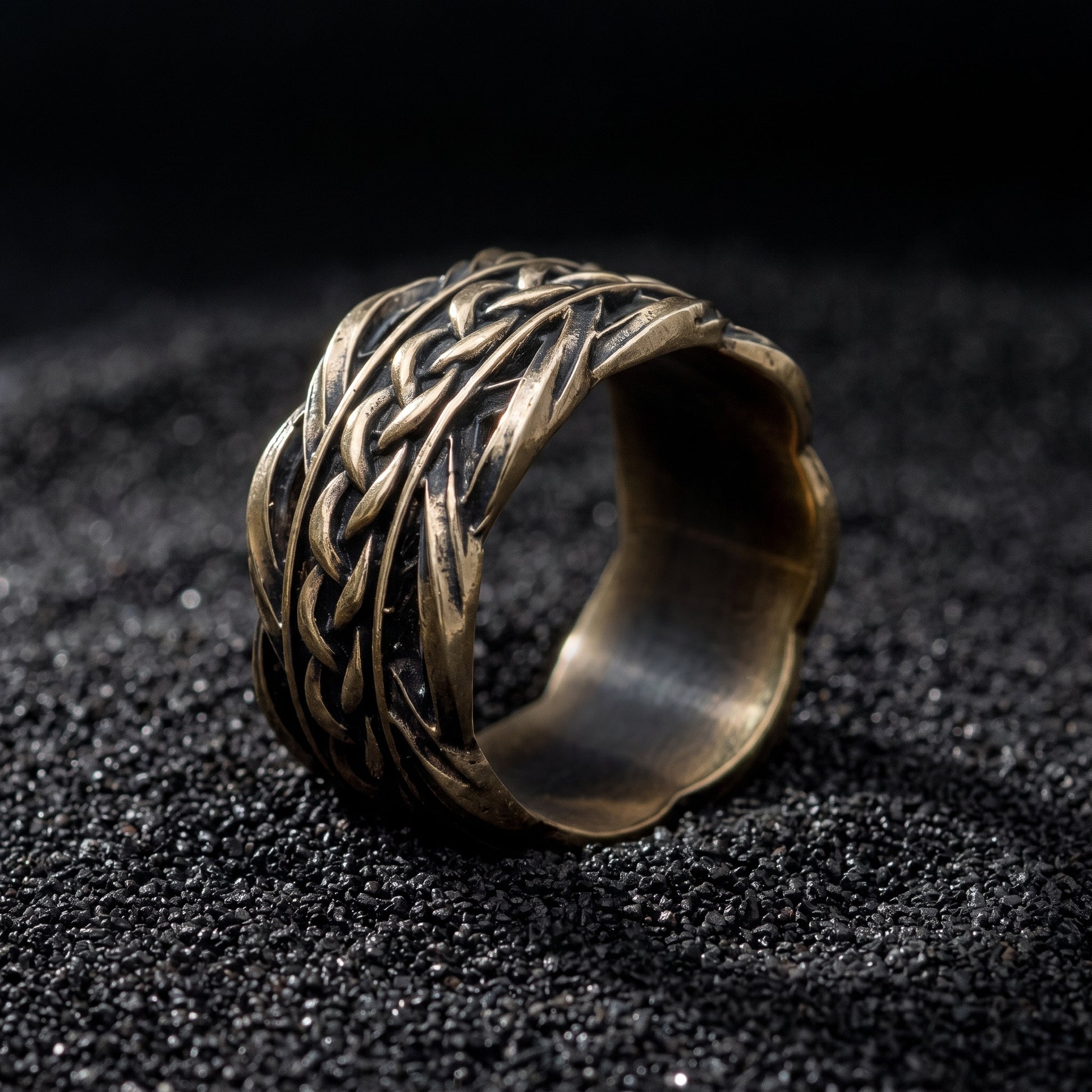 Bronze Viking wedding ring from the side, scalloped rims and plain polished interior