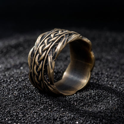 Bronze Viking wedding ring from the side, scalloped rims and plain polished interior