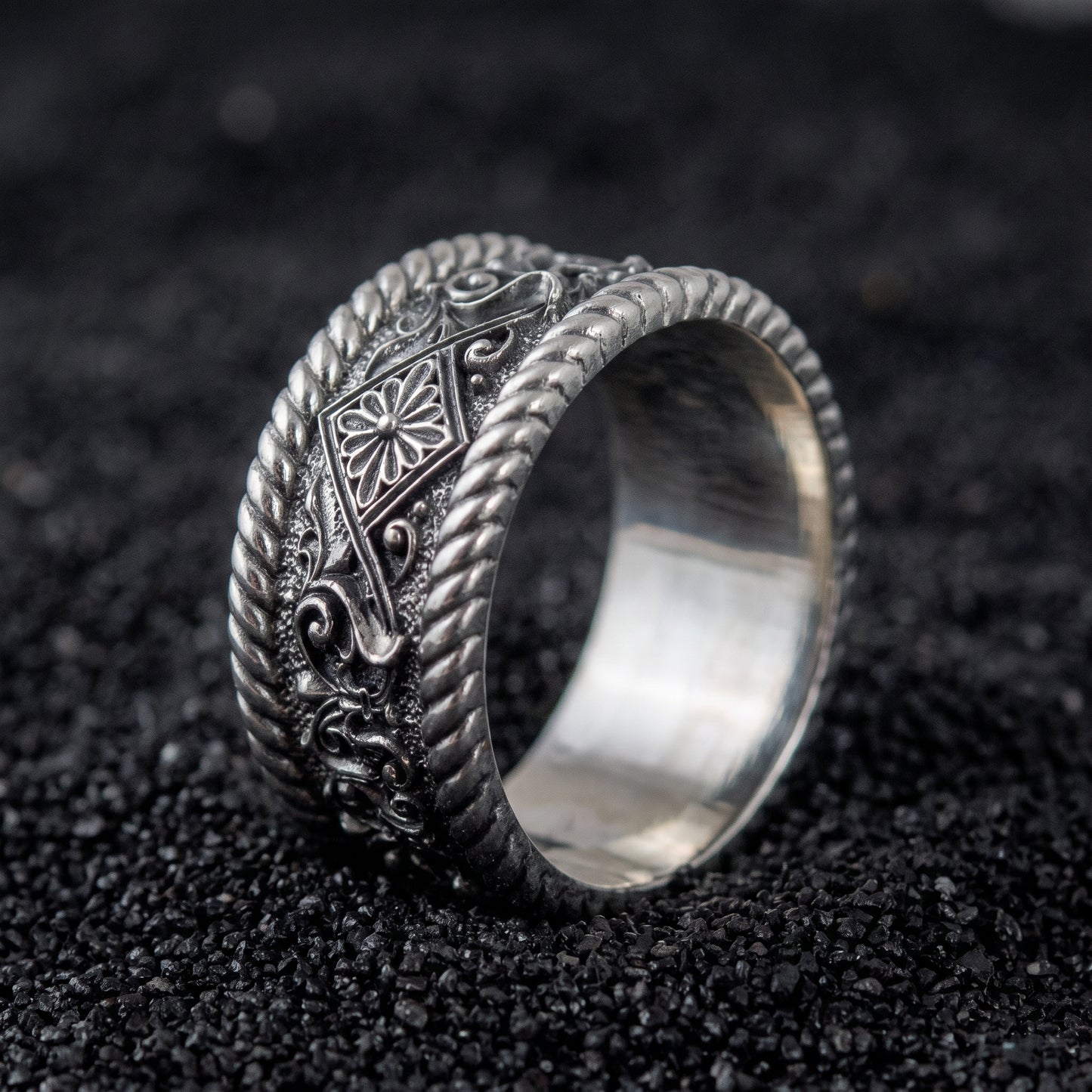 Viking wedding ring in 925 sterling silver with carved ornament between twisted rope borders
