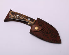 Huginn & Muninn seax knife sheathed in its brass-snap leather sheath alongside the bare blade